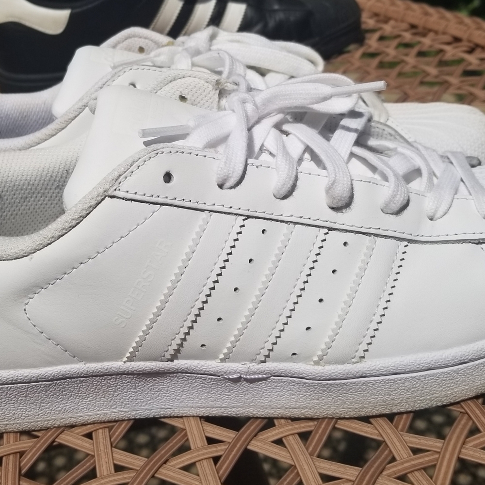 All white men's size 11 Addidas  Superstars